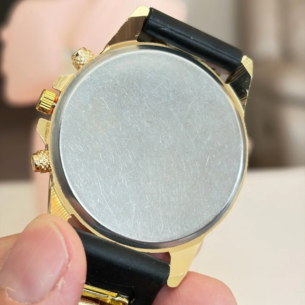 Geneva Black Dial Gold Bezel Watch.